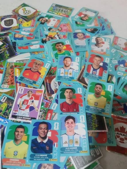Stacks of Panini FIFA World Cup 2026 stickers with shiny special stickers visible
