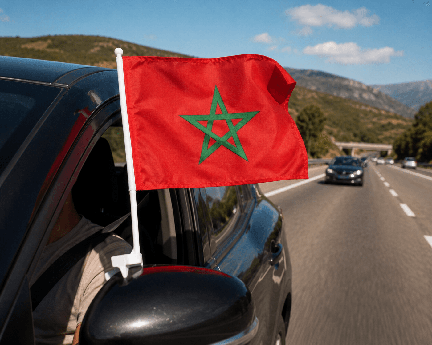Morocco flag car window flag waving on a highway